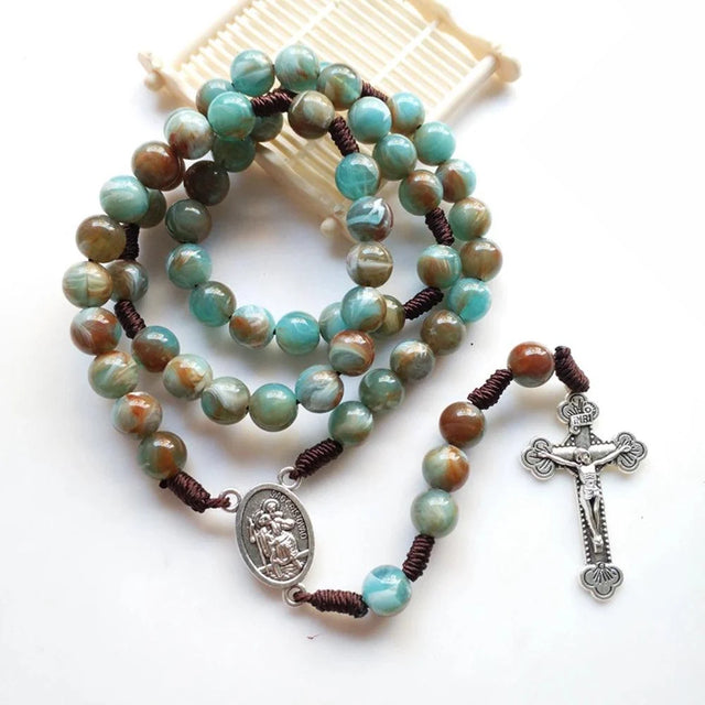Medalha e crucifixo do Terço de Nossa Senhora Aparecida